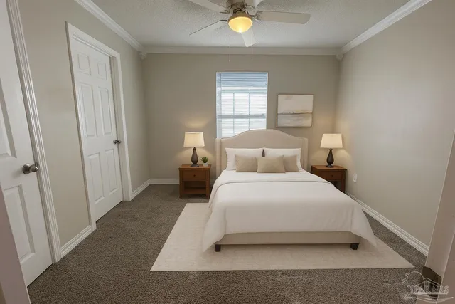 a bedroom with a bed and window