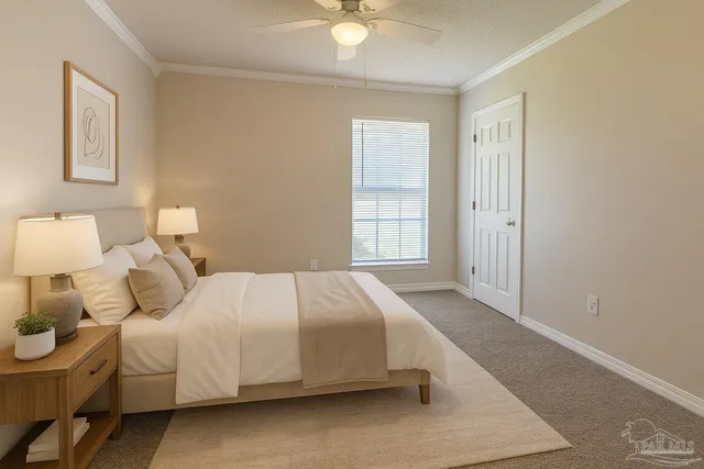 a bedroom with a bed and a night stand