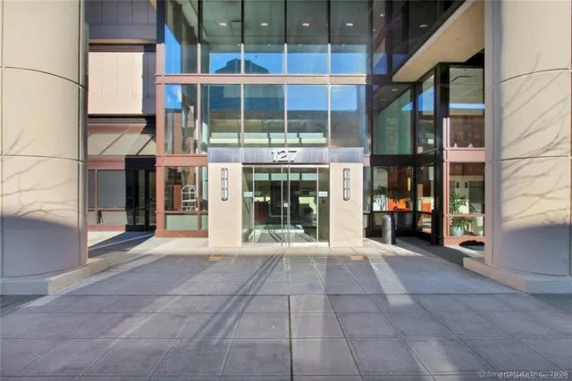 a view of a building with a glass door