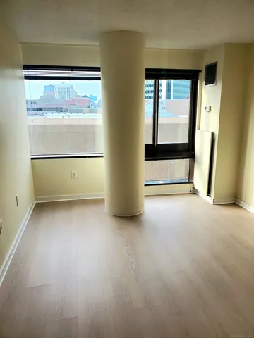 a view of an empty room and window