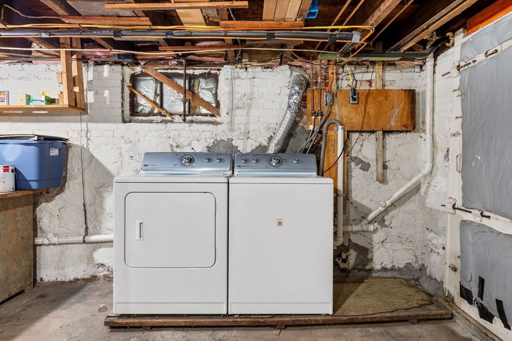 20 Trinity Avenue Lynn, MA 01902 - Photo 27 of 29 a utility room with dryer and washer