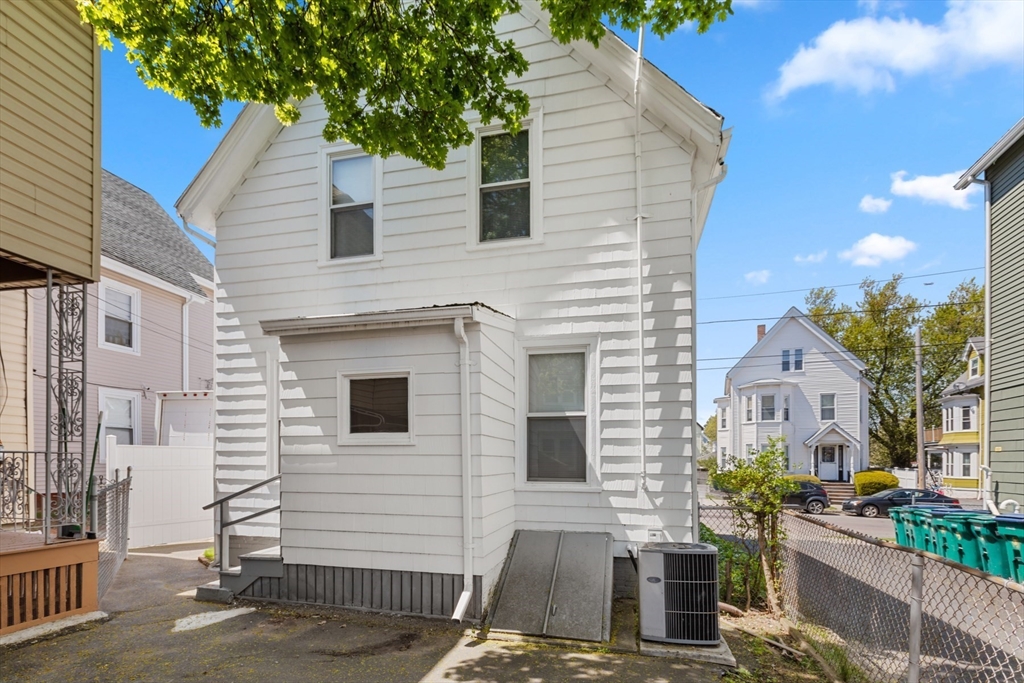 20 Trinity Avenue Lynn, MA 01902 - Photo 28 of 29 a view of a house with a street
