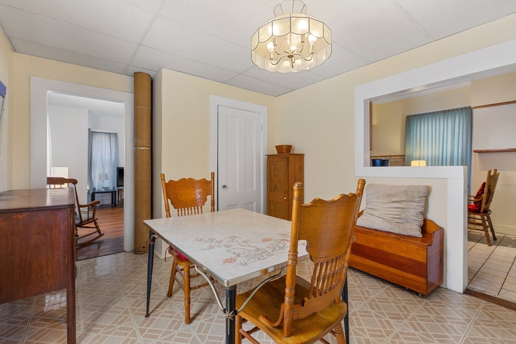 20 Trinity Avenue Lynn, MA 01902 - Photo 6 of 29 a view of a dining room with furniture