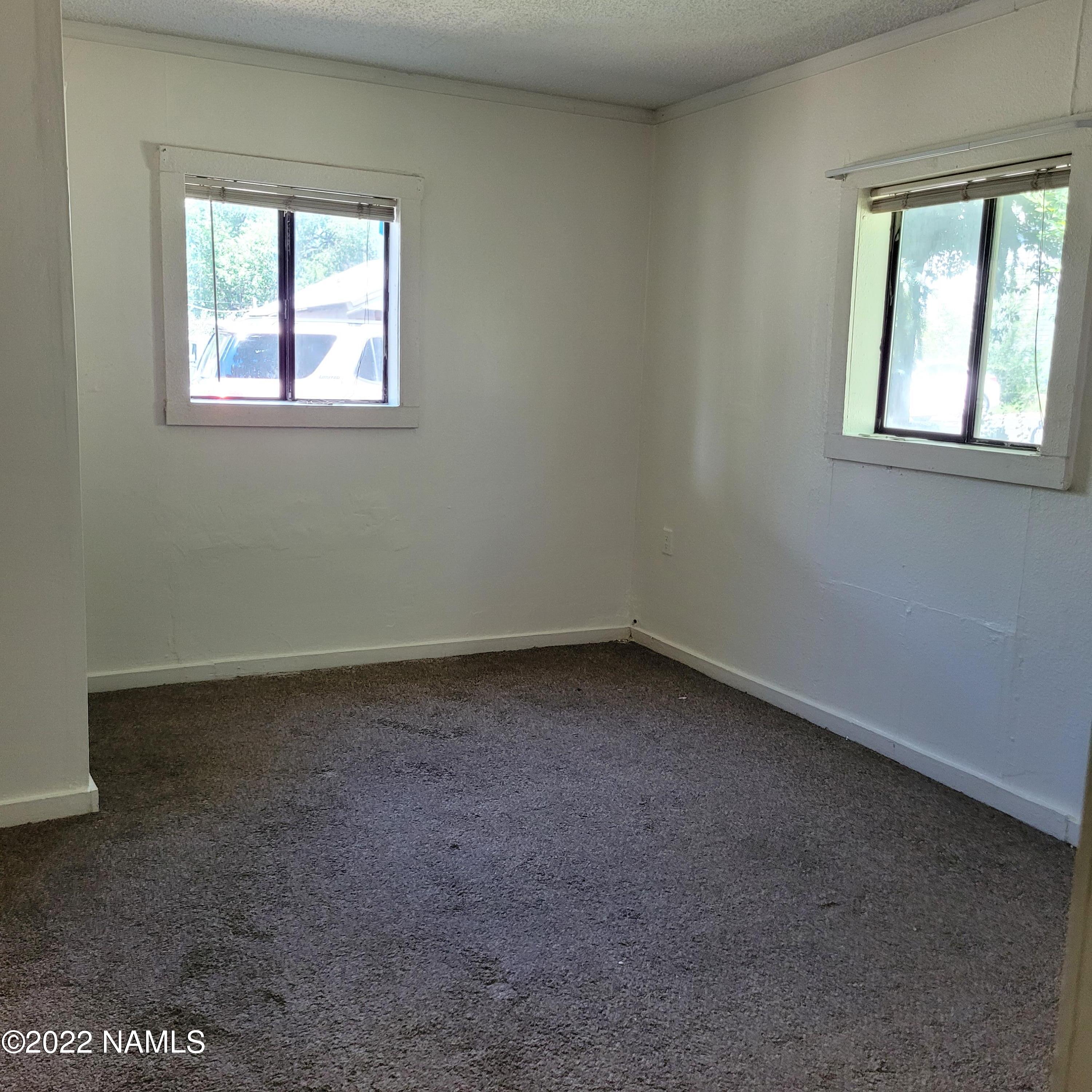 418 South WC Riles Drive Flagstaff, AZ 86001 - Photo 9 of 11 an empty room with a window