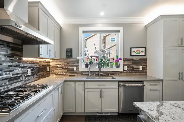 a bathroom with a sink vanity and a mirror