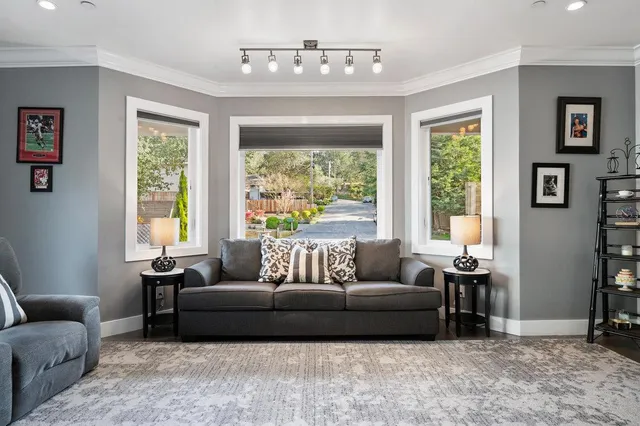 a bathroom with a tub shower and window