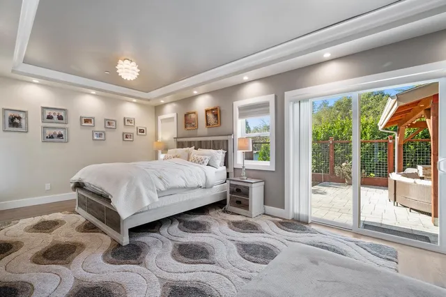 a view of a two chair and table in the balcony