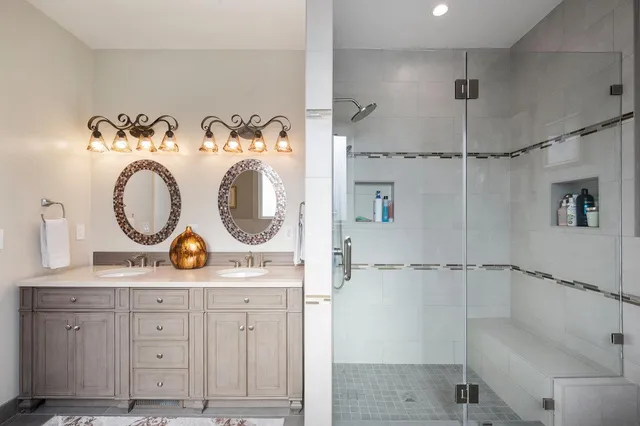 a view of a backyard with furniture and a tub