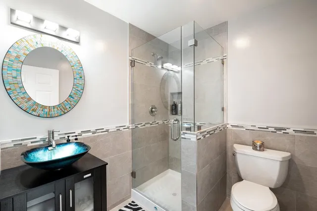 a view of a house with backyard porch and sitting area