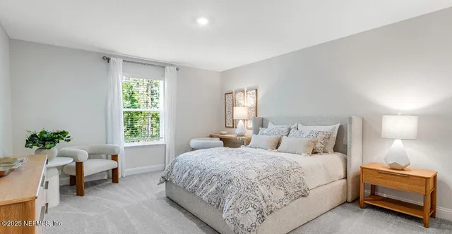 a dining room with a table and chairs