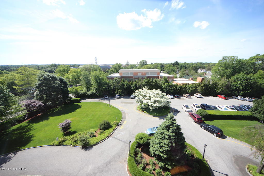 47 Lafayette Place, Unit 5D Greenwich, CT 06830 - Photo 2 of 8 a view of a lake with a city