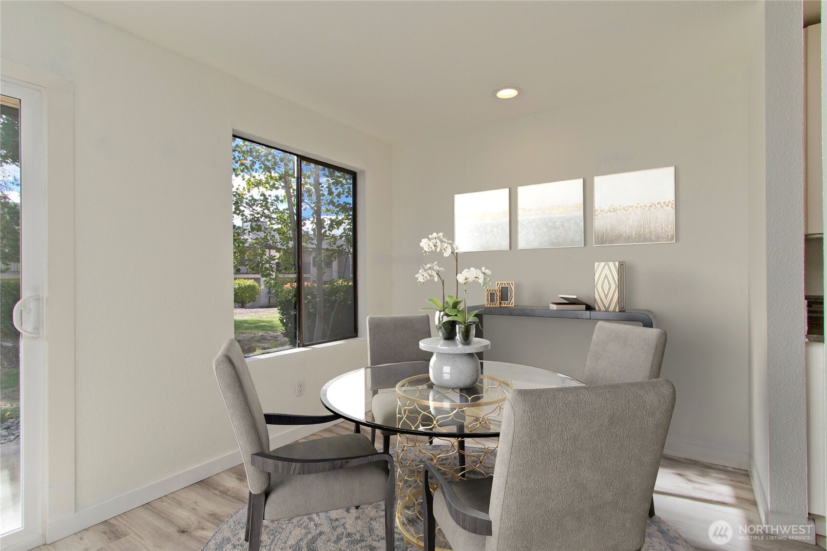 12515 Northeast 145th Place, Unit D127 Kirkland, WA 98034 - Photo 9 of 21 a view of a dining room with furniture window and outside view