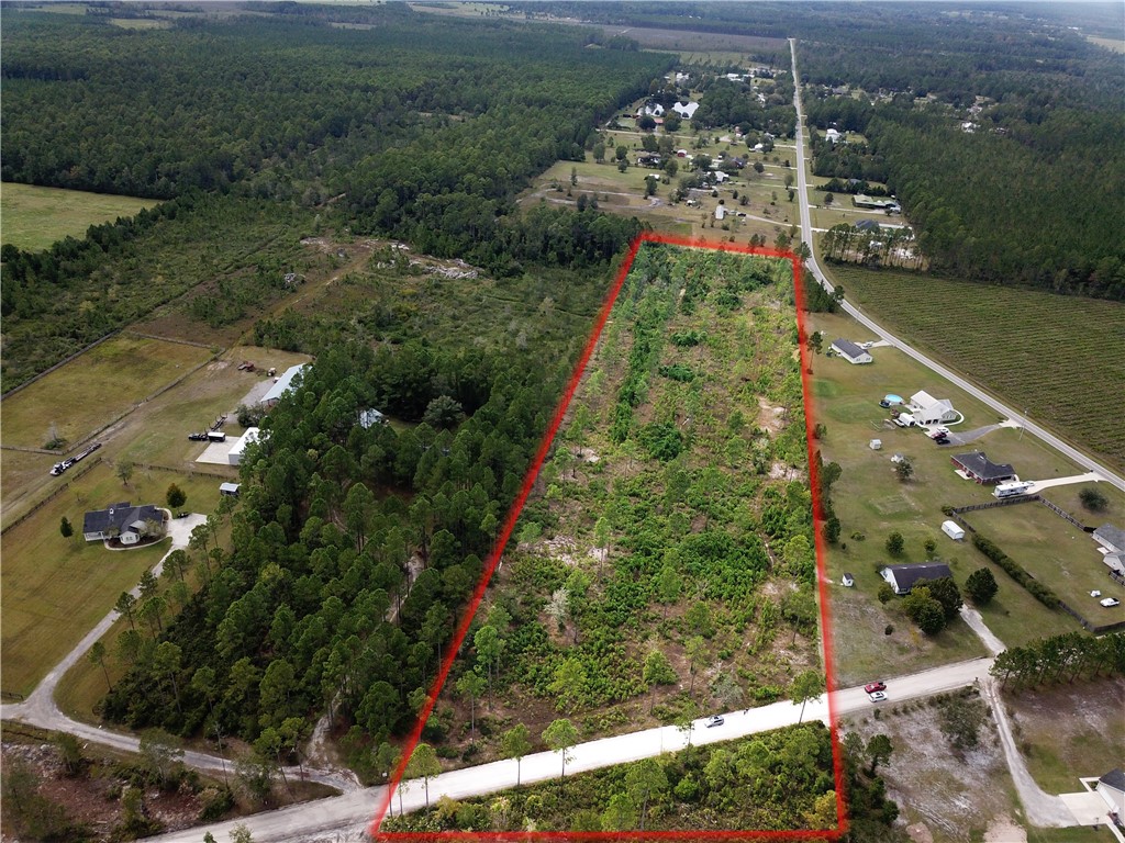 0 Geiger Road Hilliard, FL 32046 - Photo 2 of 2 a city view with tall buildings