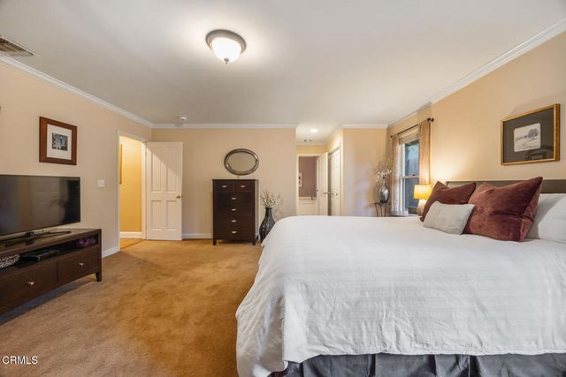 a white bath tub sitting next to a window
