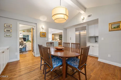 a room with furniture a rug and a window