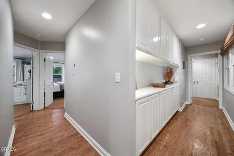 a bedroom with a bed and a chair