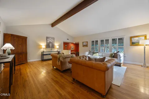 a view of swimming pool with seating space