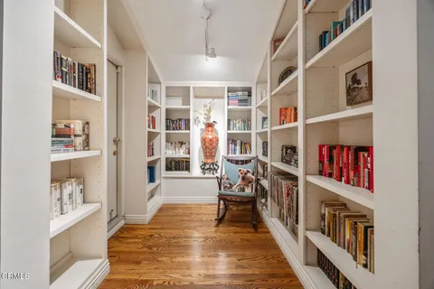 a spacious bedroom with a bed and a couch