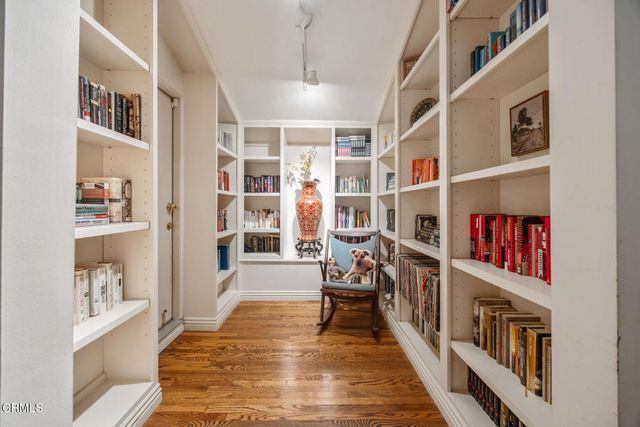 a spacious bedroom with a bed and a couch