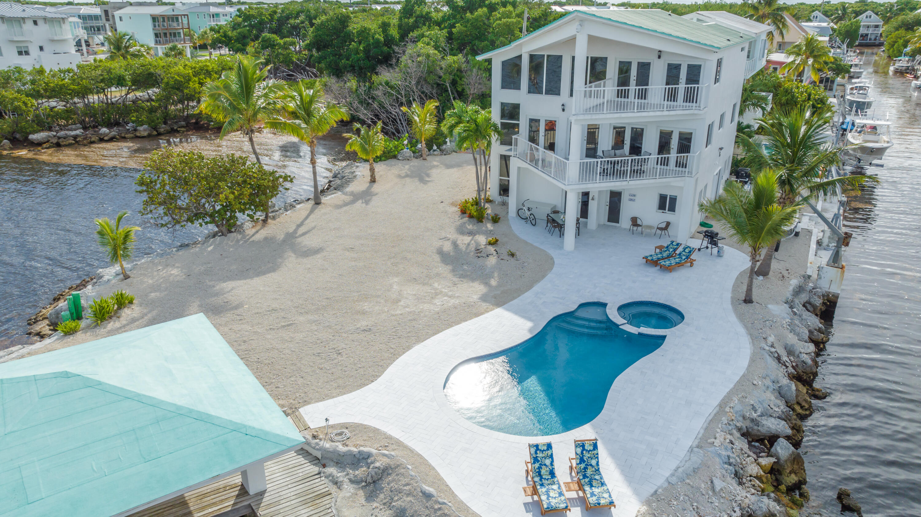 601 Cuda Lane Key Largo, FL 33037 - Photo 11 of 90 an aerial view of a house with outdoor seating
