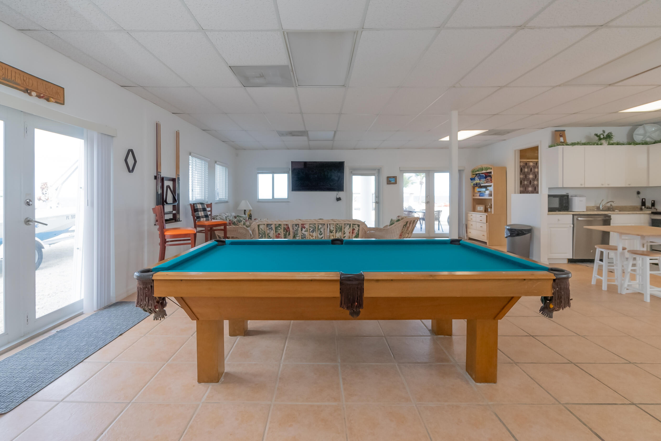 601 Cuda Lane Key Largo, FL 33037 - Photo 44 of 90 a room with pool table table tennis pool table and windows