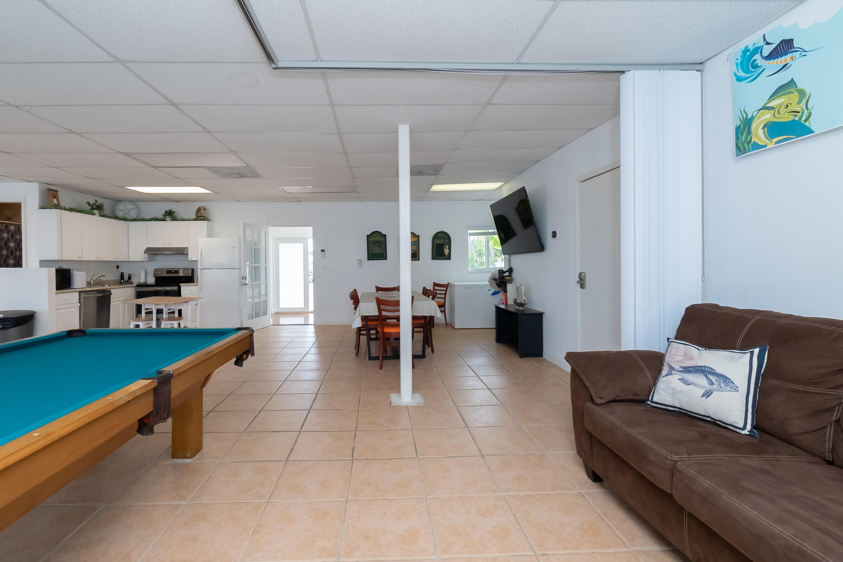 601 Cuda Lane Key Largo, FL 33037 - Photo 48 of 90 a living room with furniture and a flat screen tv