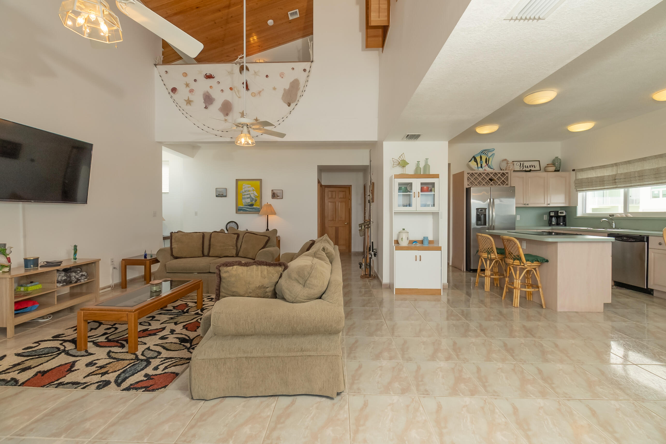 601 Cuda Lane Key Largo, FL 33037 - Photo 59 of 90 a living room with furniture and a flat screen tv