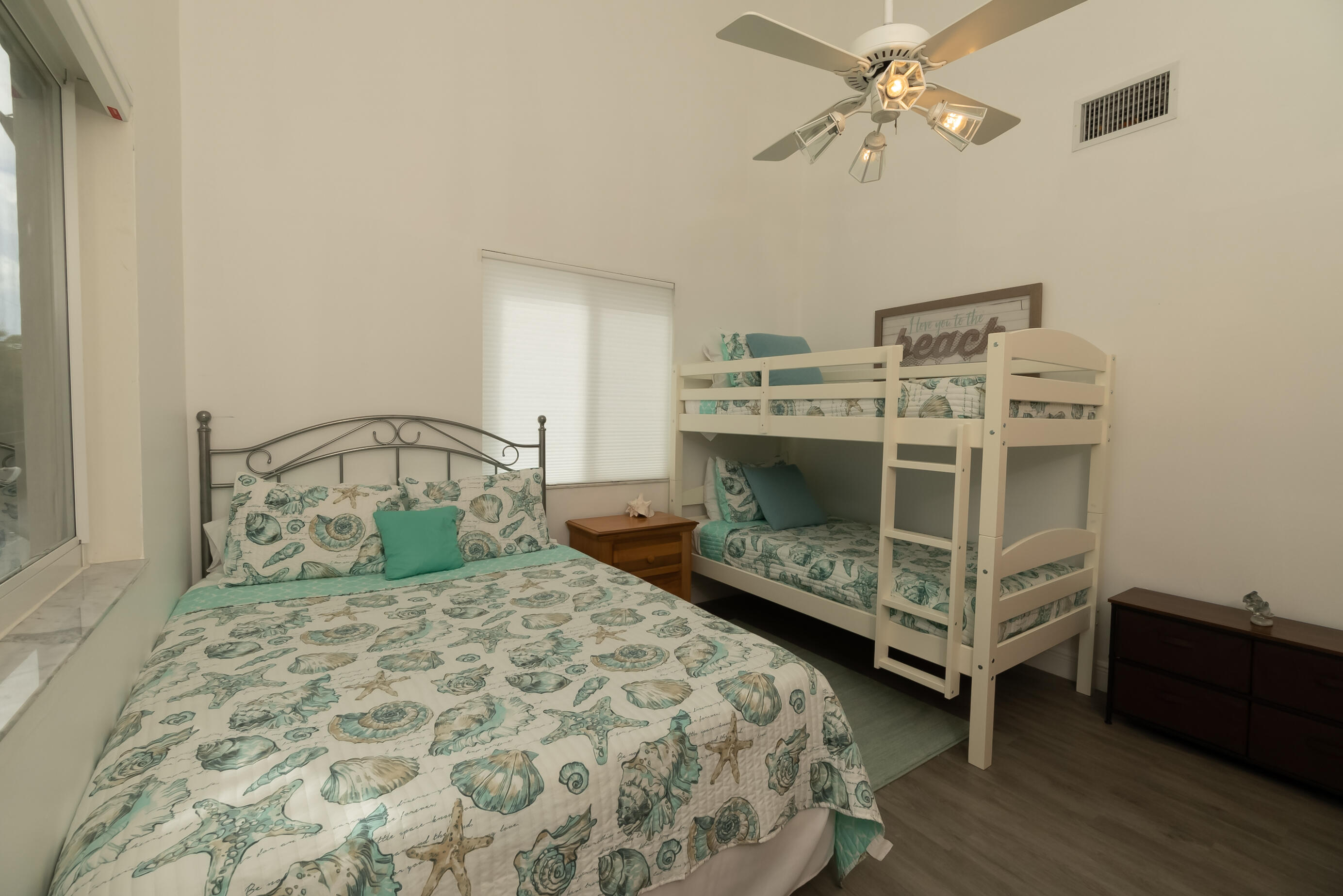 601 Cuda Lane Key Largo, FL 33037 - Photo 71 of 90 a bedroom with a bed and a table