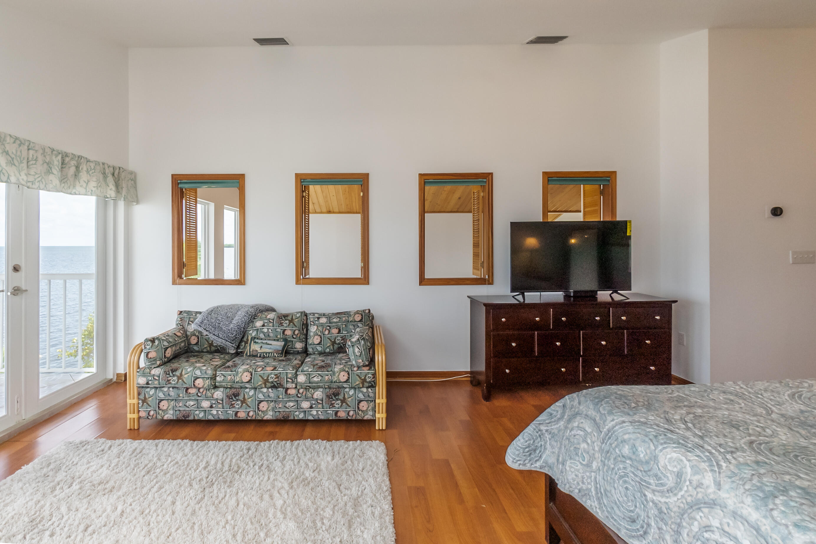 601 Cuda Lane Key Largo, FL 33037 - Photo 81 of 90 a living room with furniture and a flat screen tv