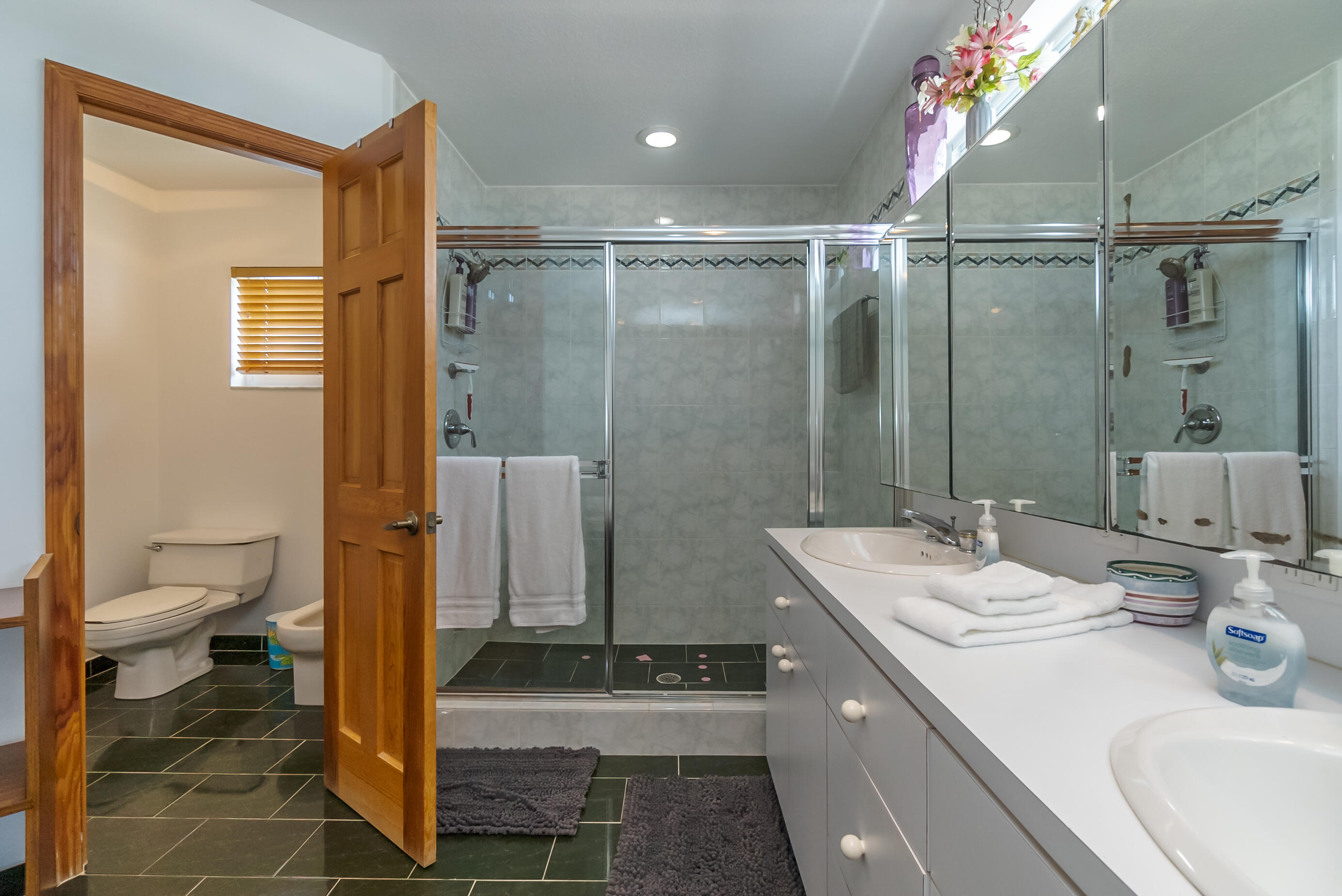 601 Cuda Lane Key Largo, FL 33037 - Photo 82 of 90 a bathroom with a double vanity sink toilet and shower