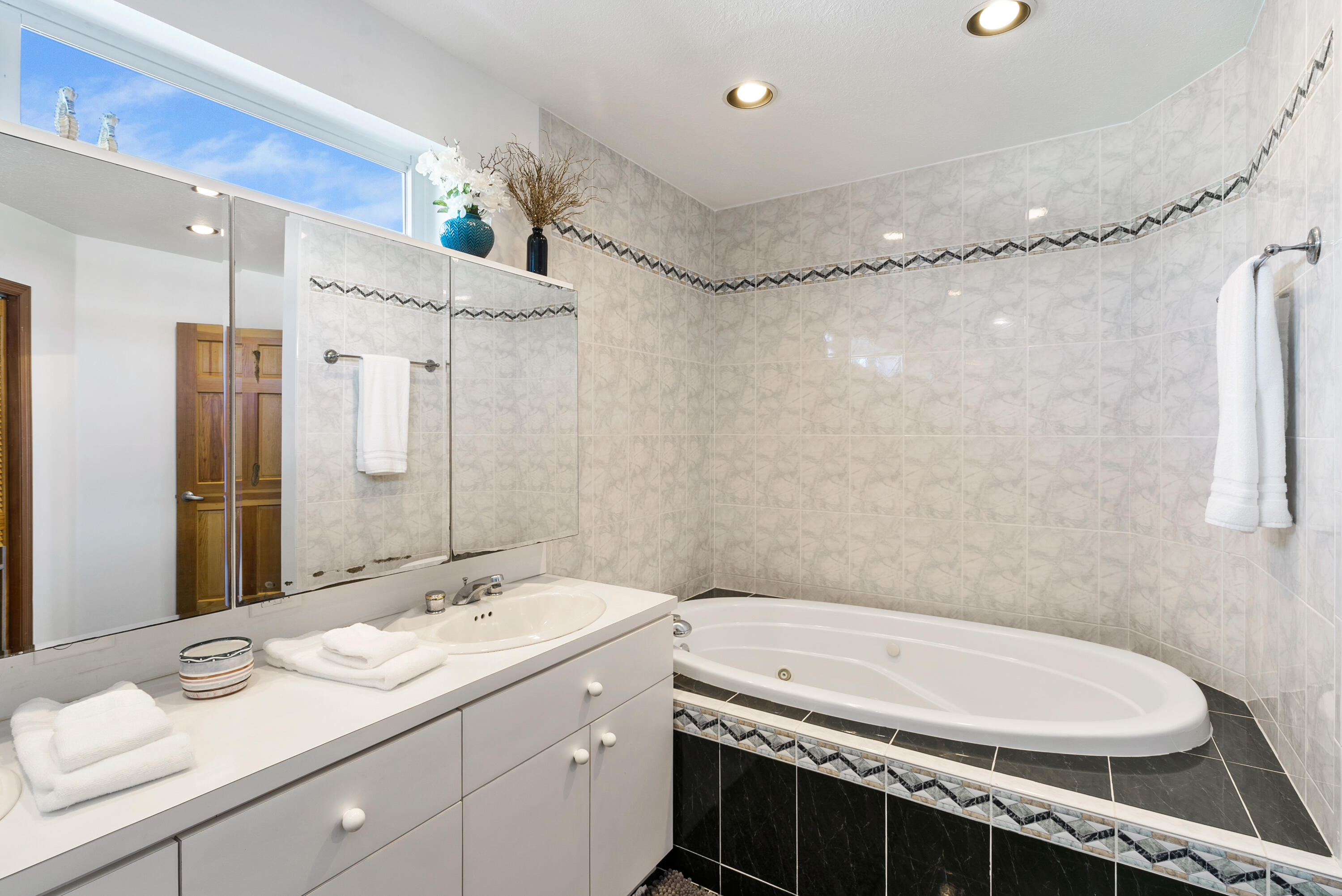 601 Cuda Lane Key Largo, FL 33037 - Photo 85 of 90 a bathroom with a granite countertop sink a toilet a mirror and shower