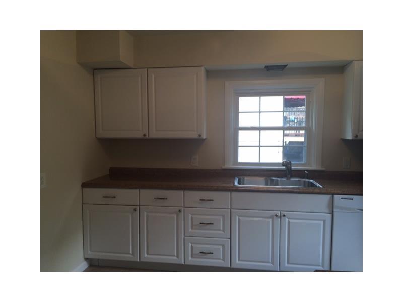 4843 Baptist Road Whitehall, PA 15227 - Photo 5 of 16 Kitchen. One side of the new kitchen with neutral cabinetry.