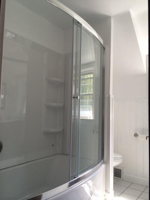 4843 Baptist Road Whitehall, PA 15227 - Photo 7 of 16 Full Bath. Enjoy showering in this spacious shower/bathtub. Shower door extends out for more room in the shower.
