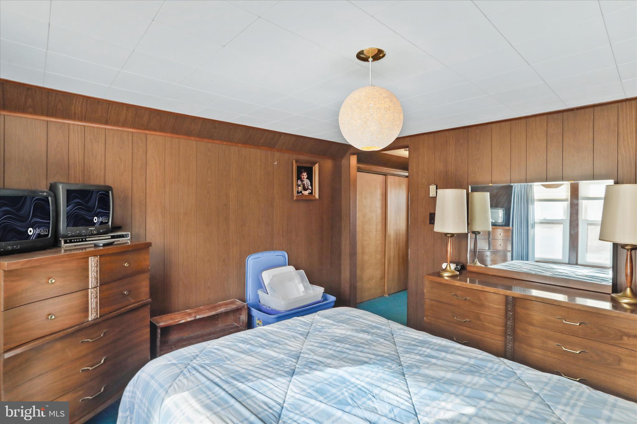 14111 Green Ridge Road Northeast Flintstone, MD 21530 - Photo 21 of 24 a bedroom with a bed and wooden floor