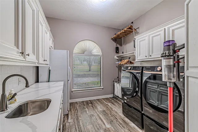 a view of a storage and utility room with racks on the wall