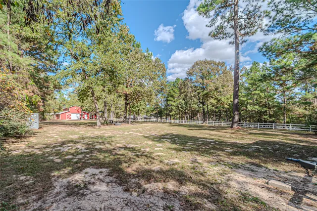 a front view of a house with garage