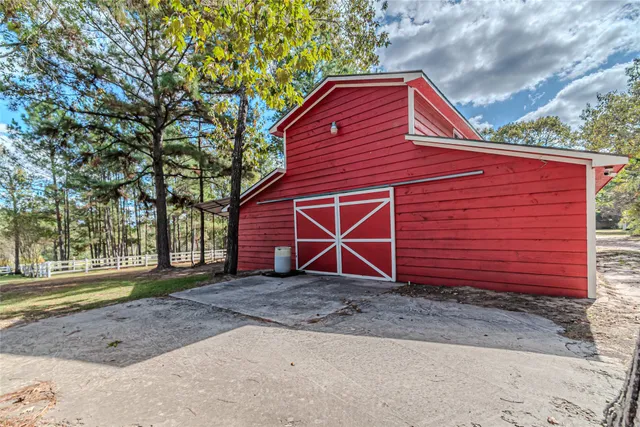 a kitchen with stove and cabinets