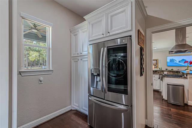 a bathroom with a sink a mirror and a toilet