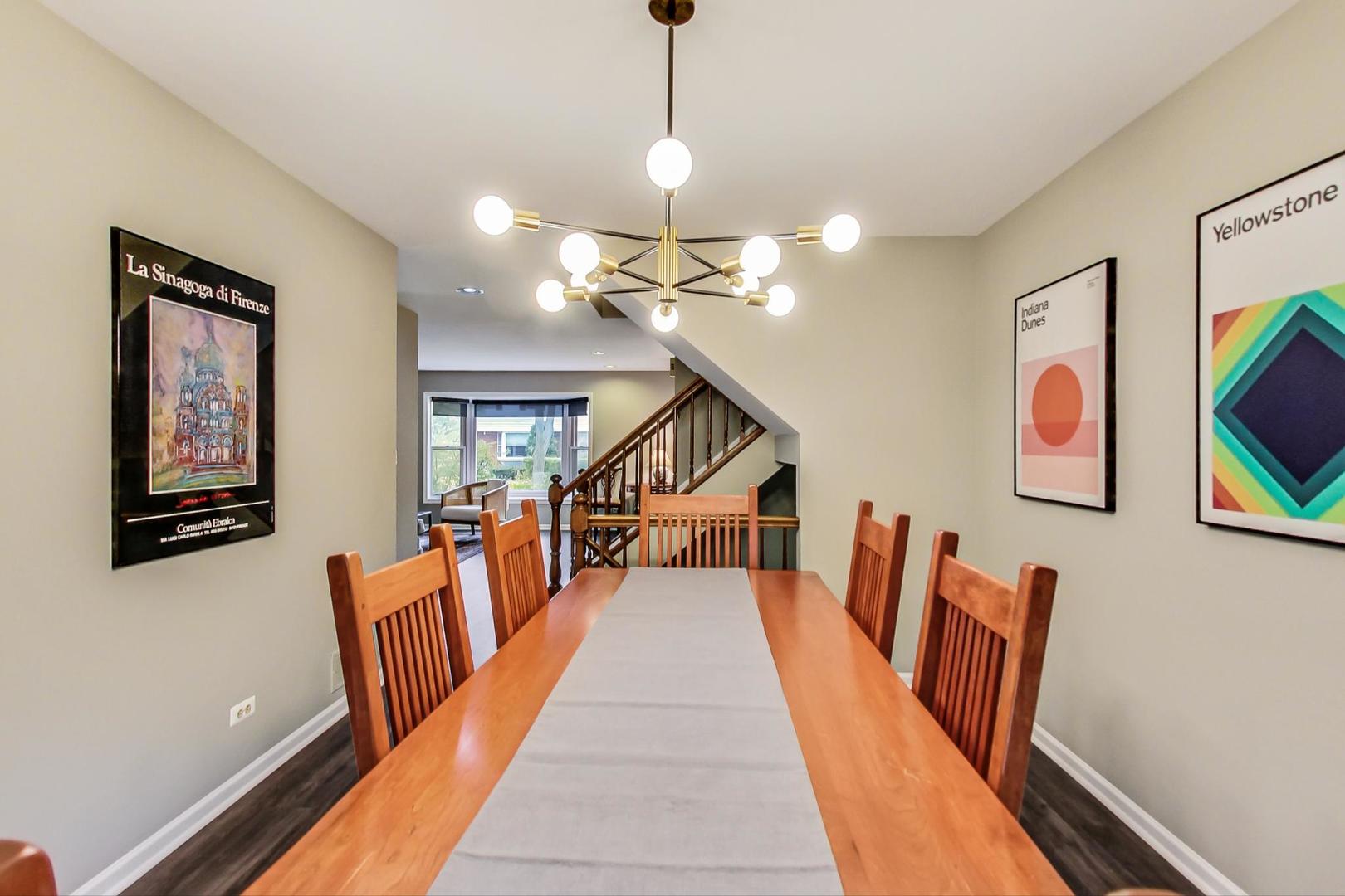 9024 Forestview Road Evanston, IL 60203 - Photo 14 of 41 a dining room with furniture and entryway