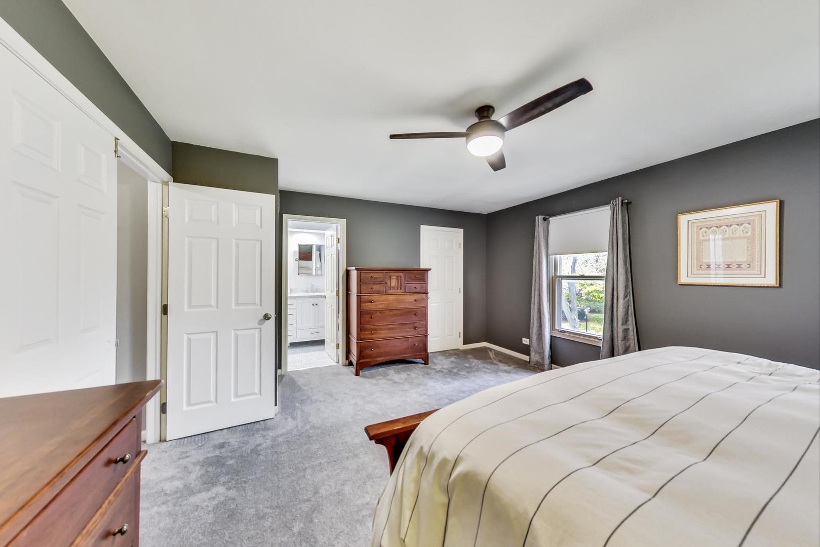 9024 Forestview Road Evanston, IL 60203 - Photo 21 of 41 a bedroom with a large bed and window