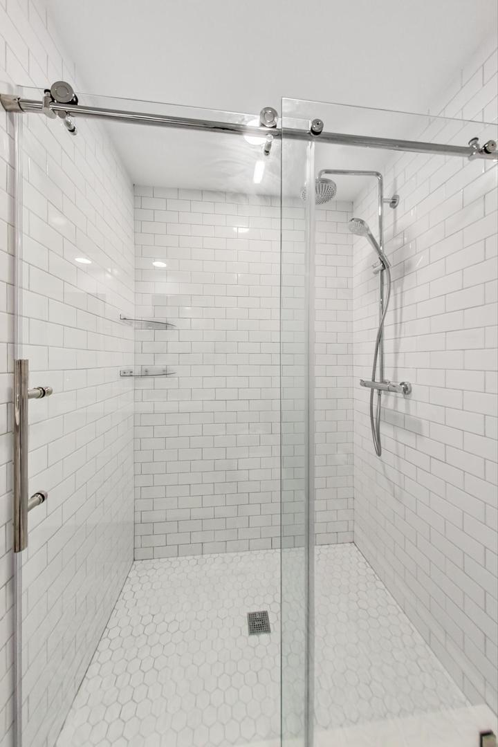 9024 Forestview Road Evanston, IL 60203 - Photo 23 of 41 a bathroom with a shower