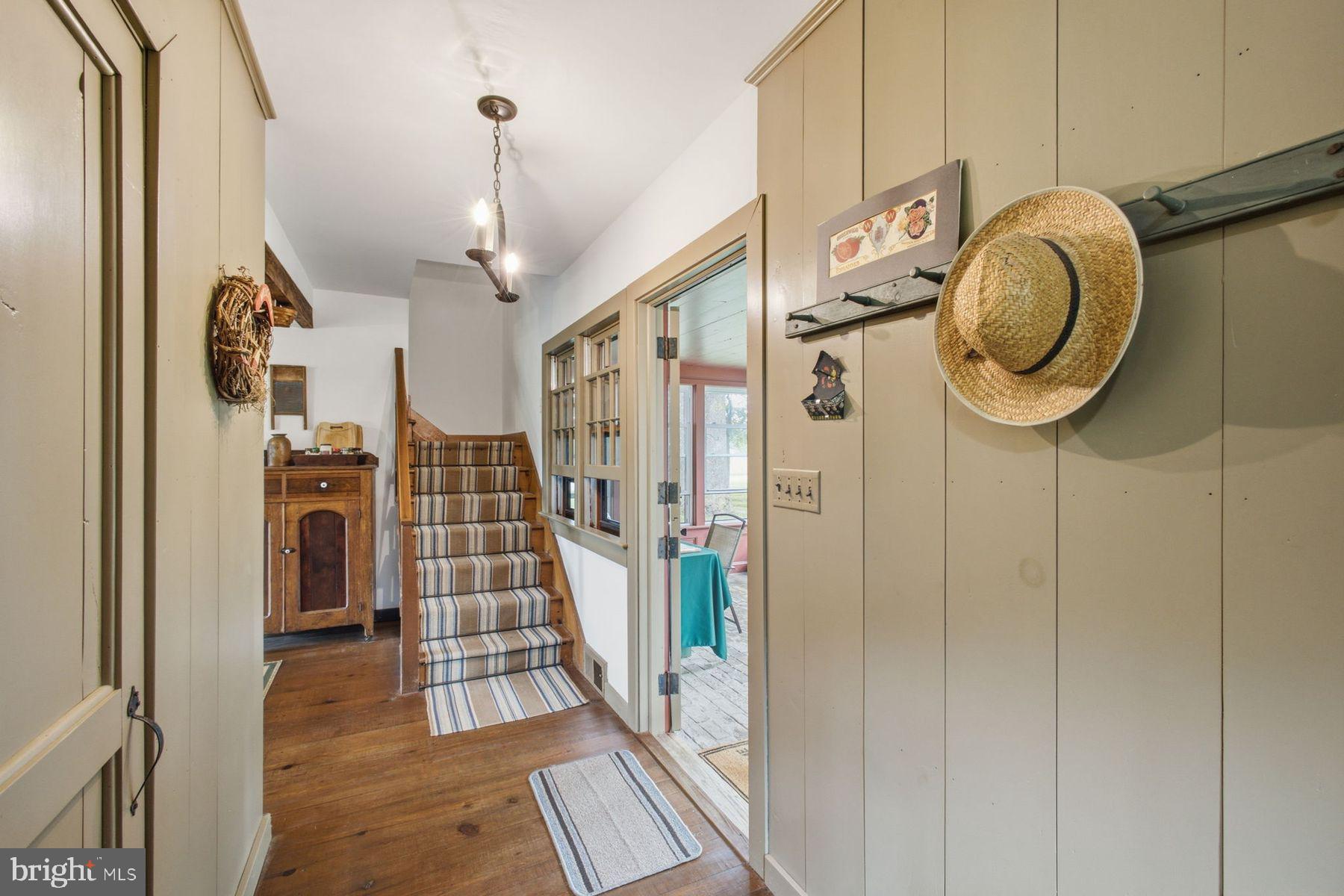255 Old Mill Road Greenwich, NJ 08323 - Photo 8 of 35 a view of a hallway with wooden floor and entryway