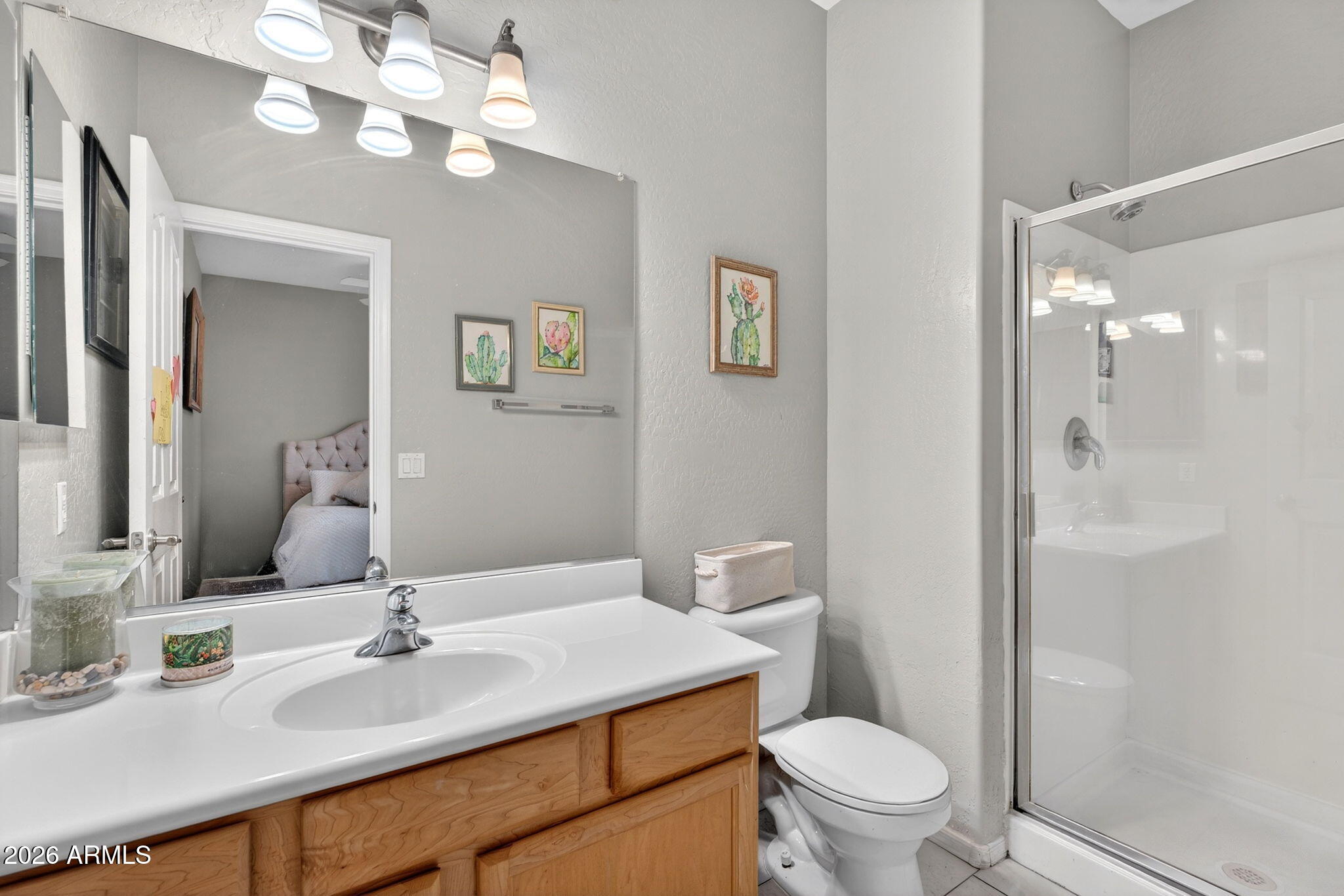 6280 South Sinova Court Gilbert, AZ 85298 - Photo 26 of 64 a bathroom with a sink vanity granite toilet and a mirror