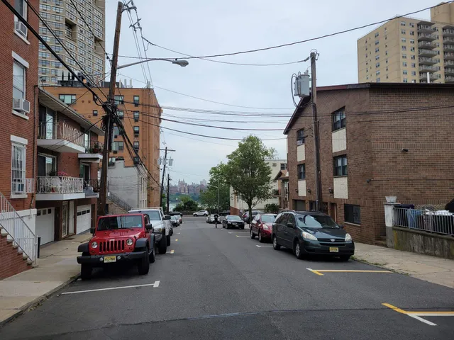 a kitchen with a sink stainless steel appliances and cabinets