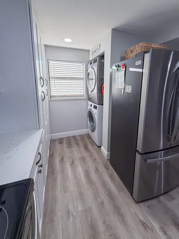 a reading room with furniture and a window