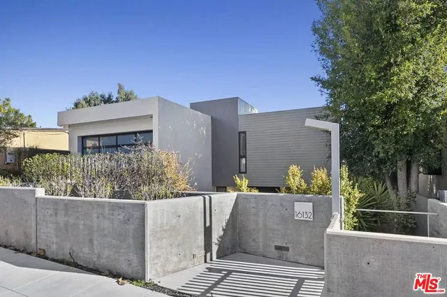 a view of balcony with furniture