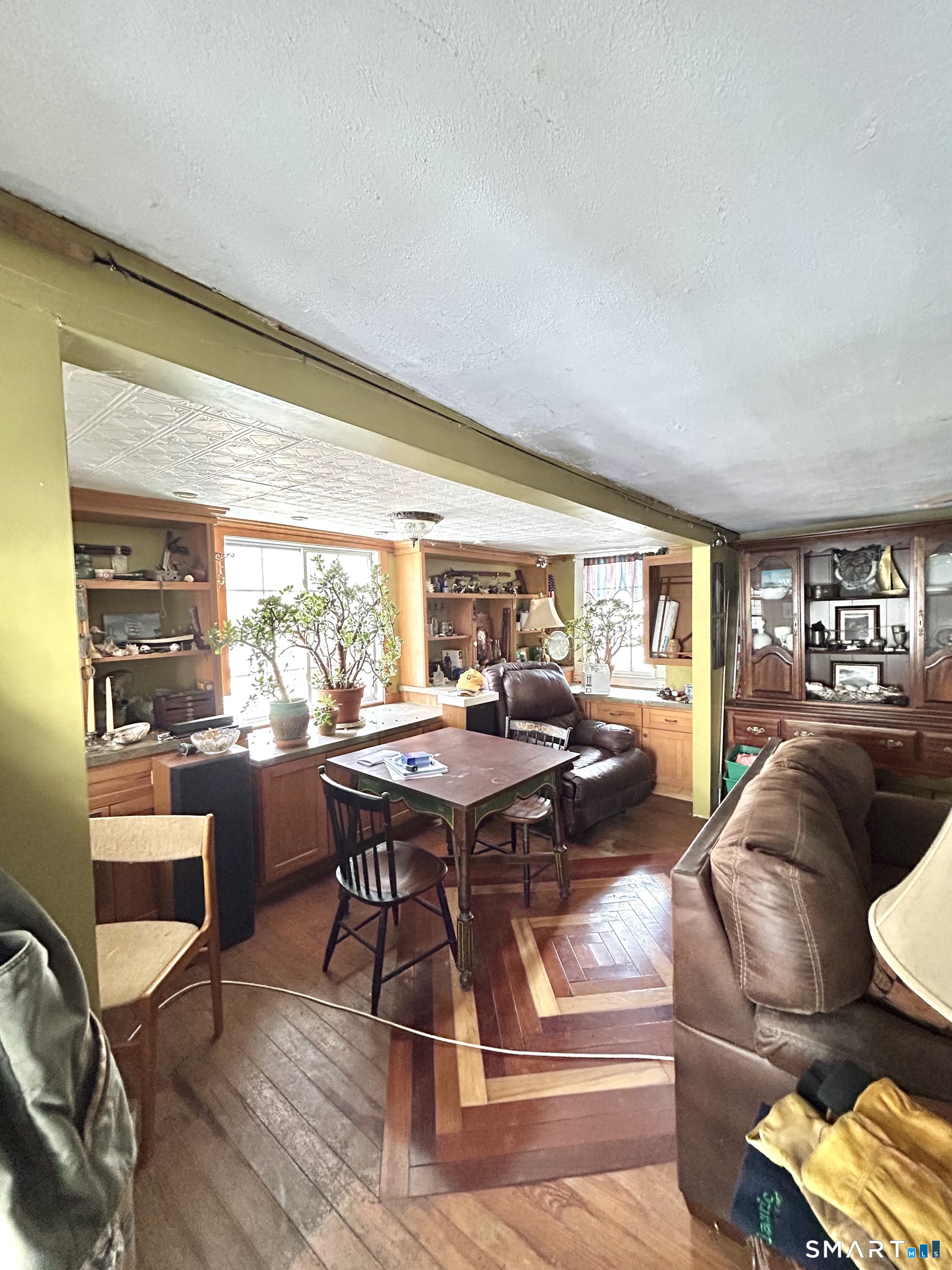 64 Bridge Street Canton, CT 06019 - Photo 2 of 12 a view of a dining room with furniture window and outside view