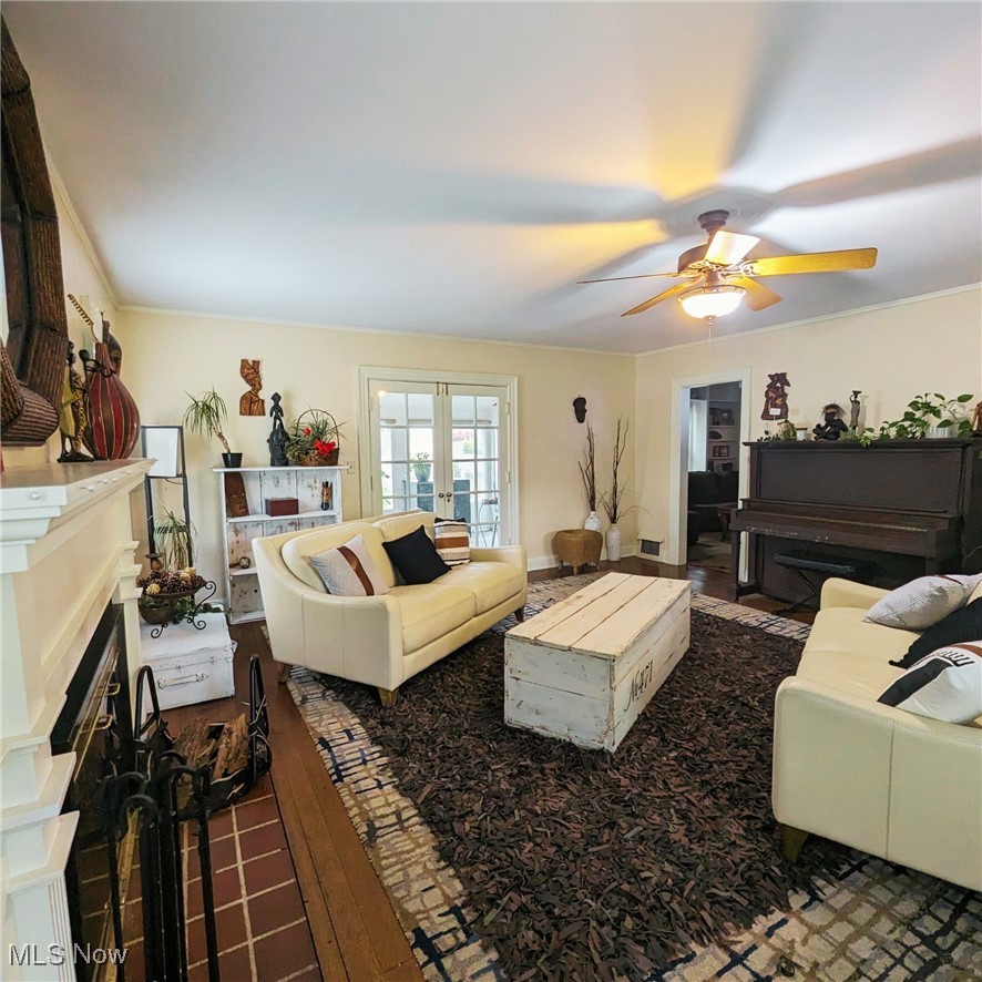 557 Cambridge Road Coshocton, OH 43812 - Photo 6 of 20 Living room with French doors leading to the bonus room & entrance family room.