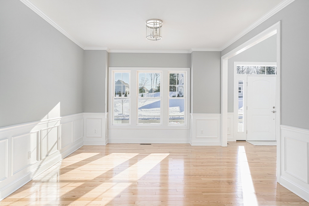 11 Cherry Tree Lane Attleboro, MA 02703 - Photo 5 of 10 a view of an empty room with a window