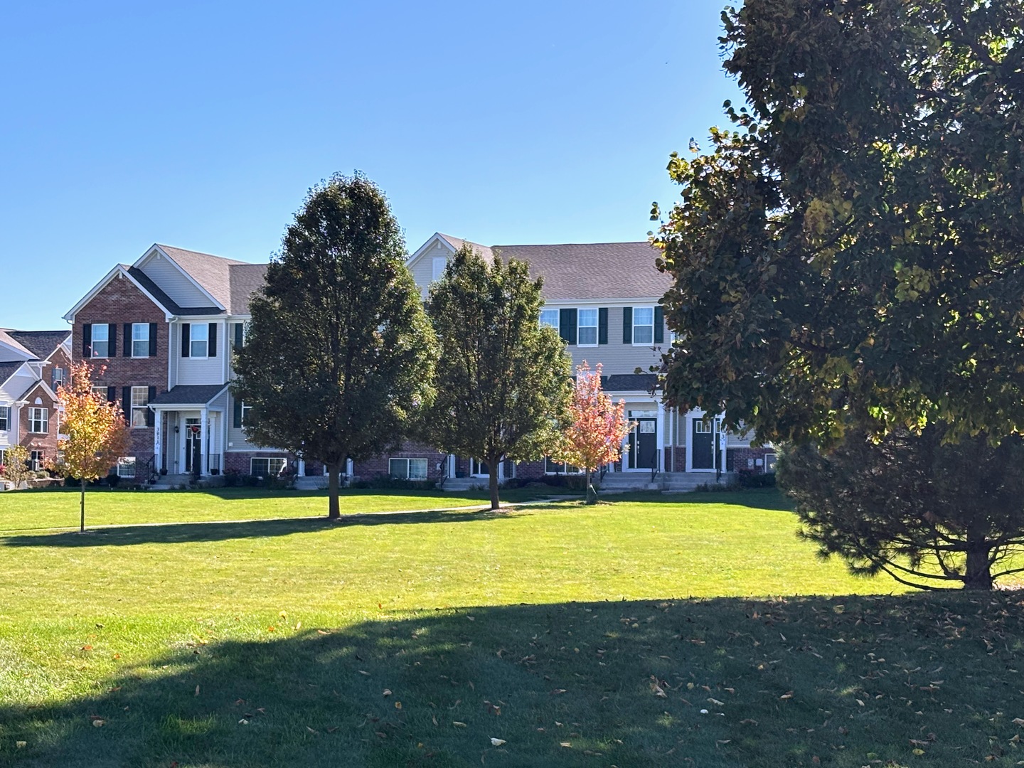 3303 Redbud Drive Lindenhurst, IL 60046 - Photo 21 of 25 a view of a house with swimming pool and a yard